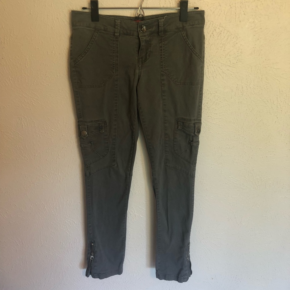 Grayish green skinny cargo pants.
